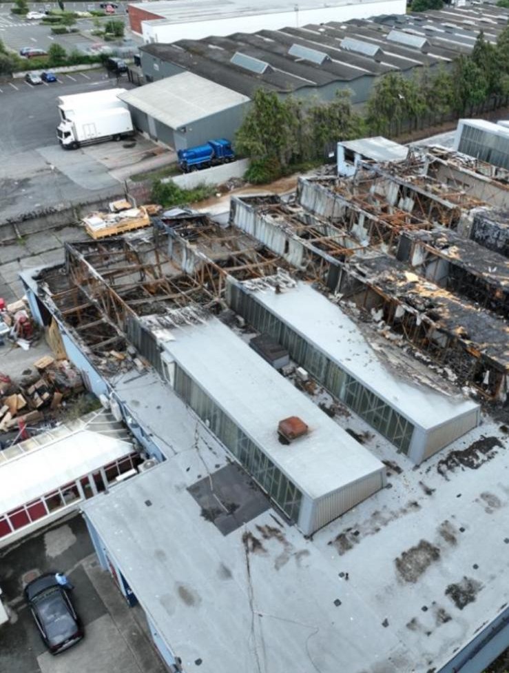 Fire-damaged commercial premises — full roof loss