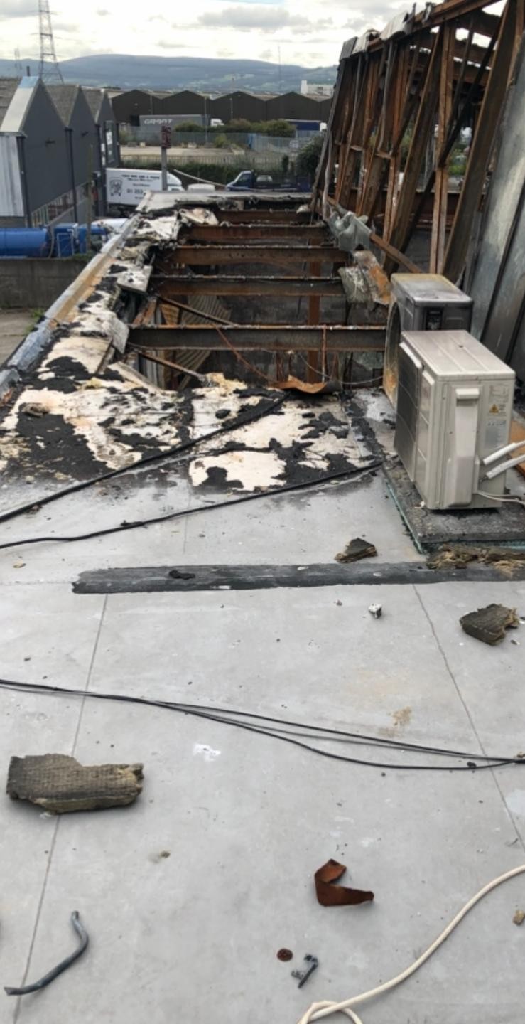 Fire damage to flat roof and structure
