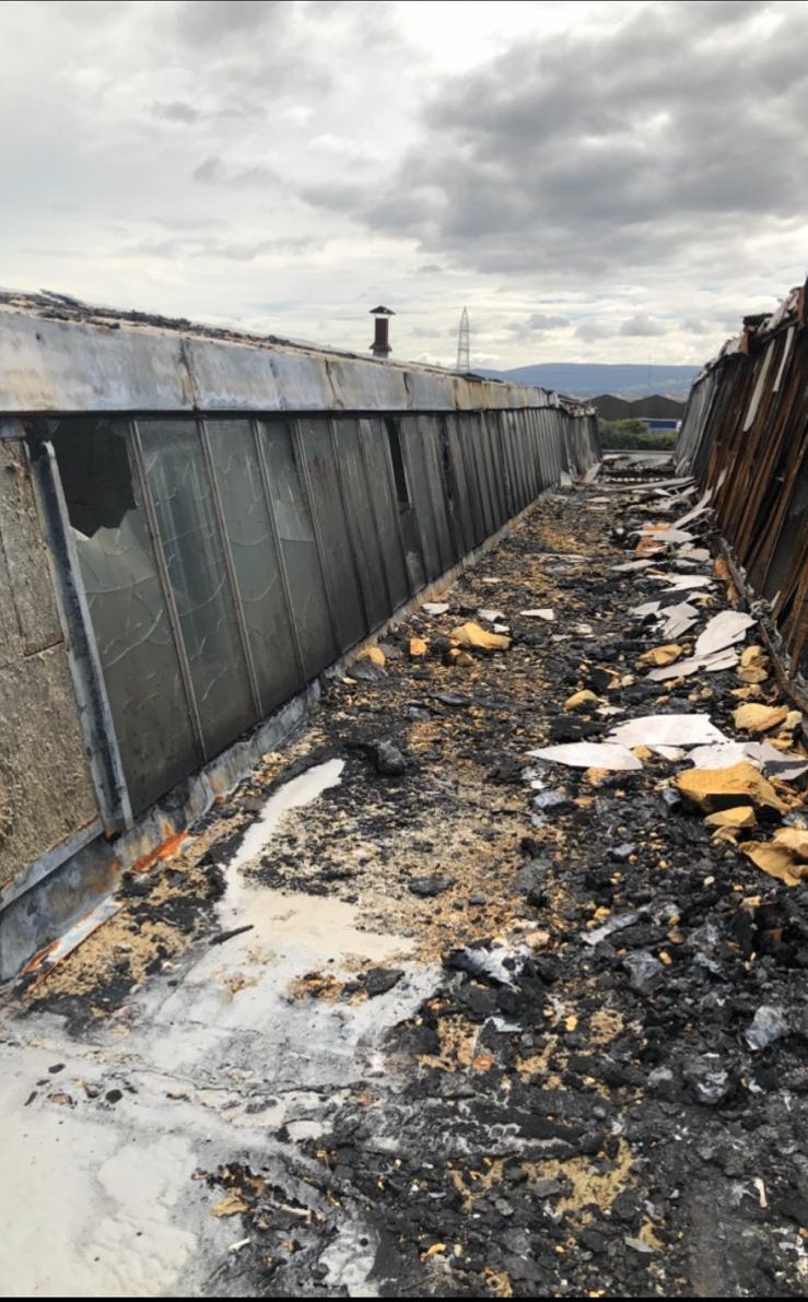 Burnt-out roof and shattered rooflights