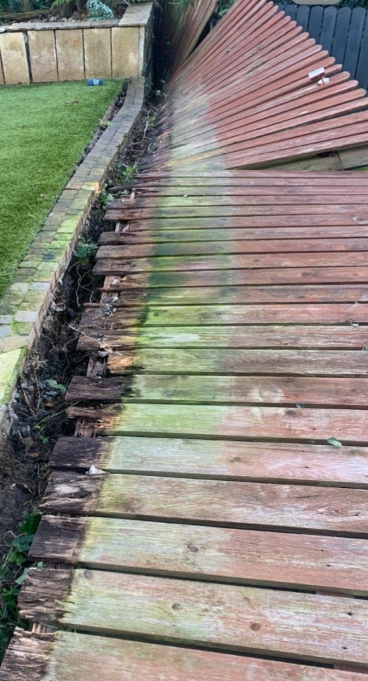 Storm-damaged decking and fencing