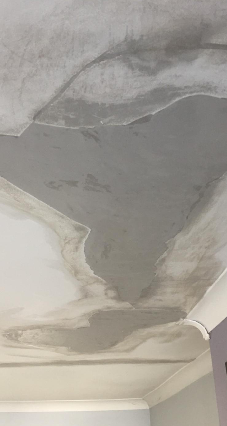 Water-stained bedroom ceiling